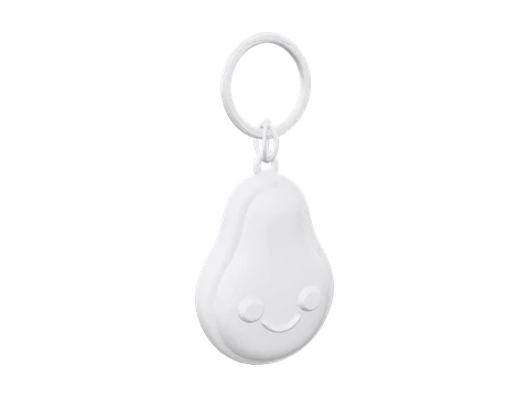 An avocado keychain made with AI, standing on its rounded bottom